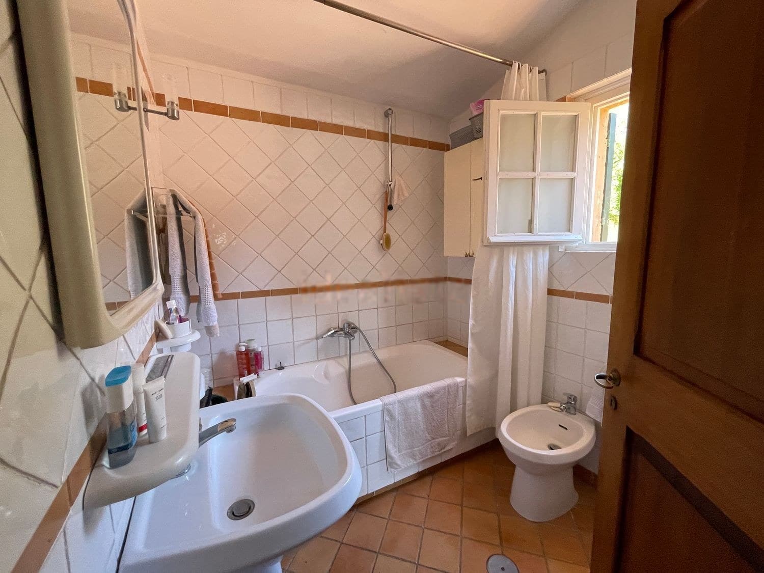 Appartamento vista mare a Cala Piccola — Bagni 3