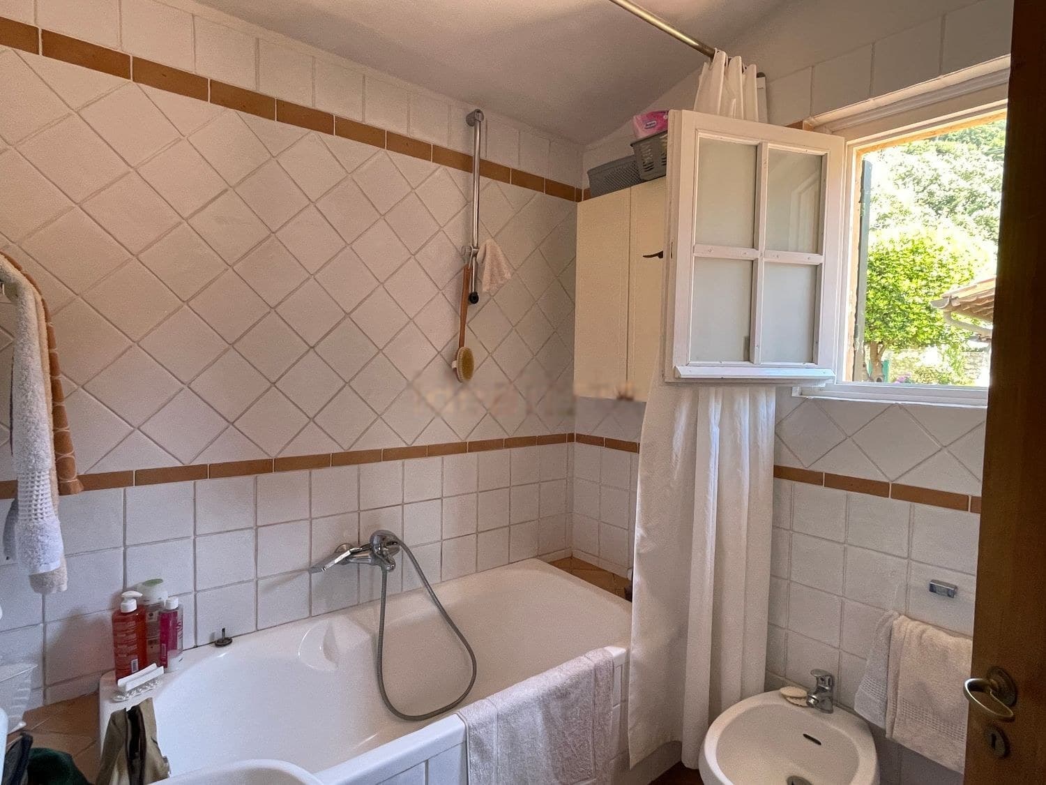 Appartamento vista mare a Cala Piccola — Bagni 4